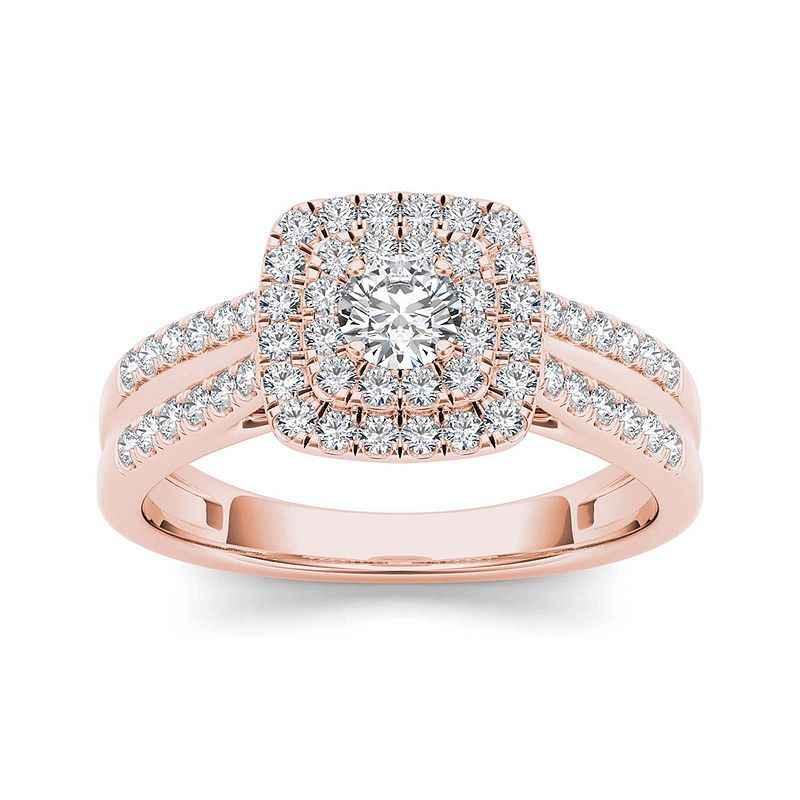 Rose gold engagement ring with cushion-shaped double halo diamonds and split shank diamond band