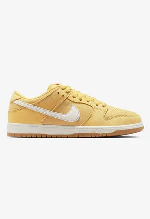 Nike SB Dunk Low Pro Saturn sneaker in yellow with white Nike swoosh and gum sole